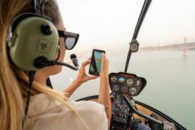 Visite de la ville de Lisbonne à 360° : visite à vélo, excursion en bateau et vol en hélicoptère