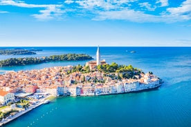 Photo of aerial view of town of Umag historic coastline architecture , archipelago of Istria region, Croatia.