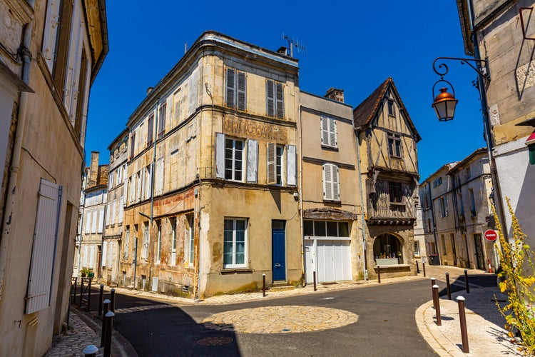 photo of view of Picturesque view of streets and old houses of Cognac town in Charente department, southwestern France.