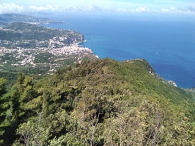 photo of Positano Amalfi Coast Italy Landscape Sunny and happiness view sea water blue and sky Italian village Ravello Nocelle Cinque terre pizza.