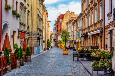 Photo of traditional houses in a pedestrian street in historical old town of Lviv, Ukraine.