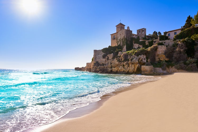 Platja de Tamarit in Altafulla of Tarragona at Catalonia and Castle.