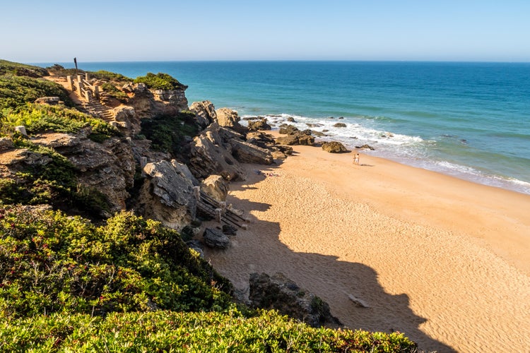 Photo of Roche beautiful coves in Conil de la Frontera, Cadiz, Spain.