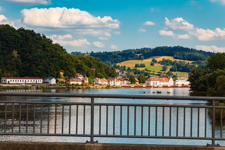 Photo of Cloudy summer view with reflections near Deggendorf, Danube, Bavaria, Germany