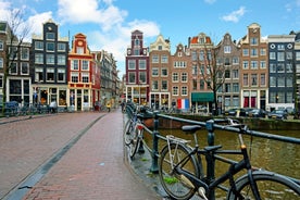 Amsterdam Netherlands dancing houses over river Amstel landmark in old european city spring landscape.