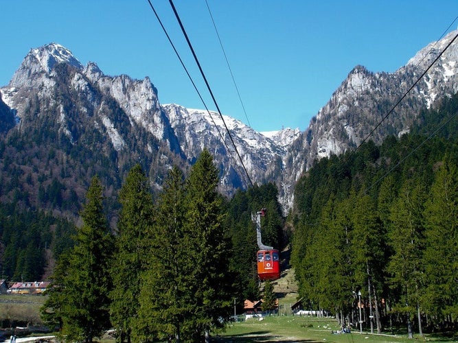 Mountain cable car, telecabin in the Bucegi Mountains. Mountain landscape in Bucegi Natural Park near Busteni, Romania.