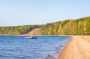 Photo of aerial view of beautiful landscape of lakes and forest in Imatra, Finland.