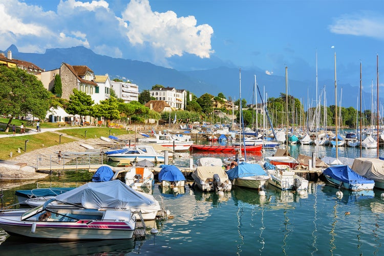 Photo of sail boats at marina on Geneva Lake Riviera in Vevey, Vaud canton, Switzerland.