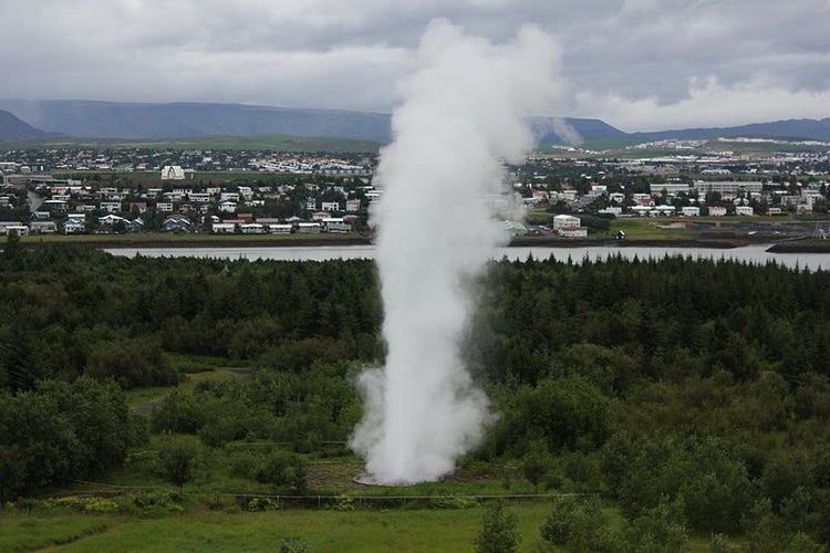 photo of view of Artificial geyser, Kópavogur in the background, Kópavogur, Iceland.