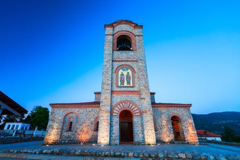Photo of the bell tower of St. Clement’s Church in Ohrid at sunset, North Macedonia.