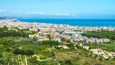 Aerial panoramic cityscape of Rome, Italy, Europe. Roma is the capital of Italy. Cityscape of Rome in summer. Rome roofs view with ancient architecture in Italy. 