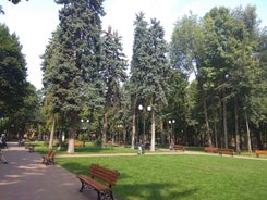 Photo of Water fountain in central square in Iasi town, Cultural Palace in background, Moldavia, Romania.