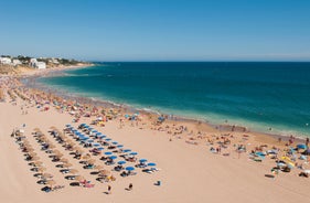 Photo of aerial amazing view of town Olhos de Agua, Algarve Portugal.