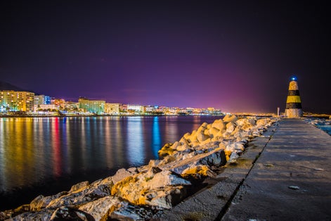 Light tower and Torremolinos.