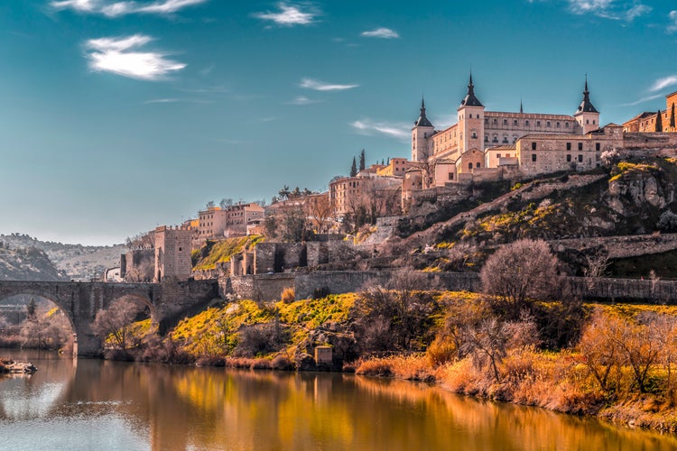 photo of view of View from the Tagus river towards the historical center of Toledo, Spain.