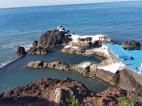 Aerial drone view of Camara de Lobos village, Madeira.