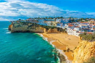 Photo of aerial view of pier fishing boats in the village Cabanas de Tavira, Portugal.