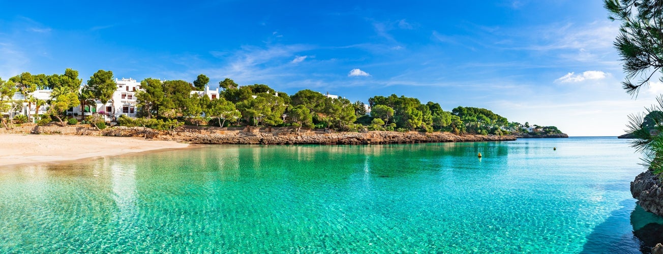 Beautiful bay cove Cala Gran, idyllic beach Majorca at Cala D'or, Spain Mediterranean Sea, Balearic Islands.