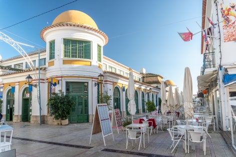 Photo of the main street with unique building in Vila Real de Santo Antonio, Algarve, Portugal.