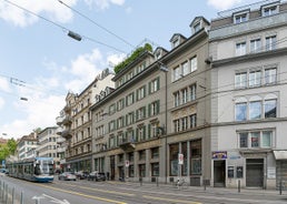 Panoramic view of historic Zurich city center with famous Fraumunster, Grossmunster and St. Peter and river Limmat at Lake Zurich on a sunny day with clouds in summer, Canton of Zurich, Switzerland