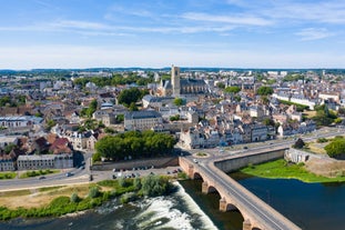 Photo of morning cityscape view with mountains, river and bridge in Grenoble city on the south-east of France.