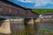 photo of view of Covered wooden bridge in the town of Lovech in Bulgaria over the Osam river.,Lovech bulgaria.