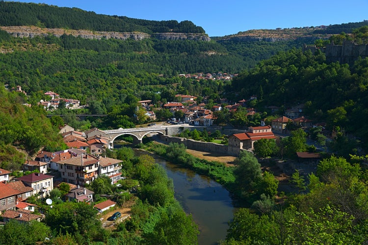 Photo of cityscape from hill Tsarevets, view of the Yantra river and the Church of The Forty Holy Martyrs in Veliko Tarnovo Bulgaria.