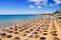 Photo of beautiful Sunny Beach with umbrellas and sunbeds in Nesebar, Bulgaria.