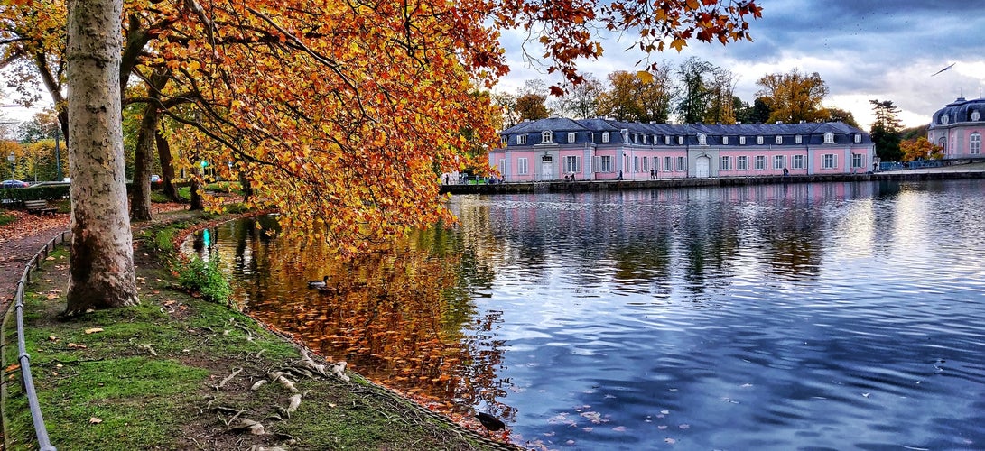 photo of view of  A picture of Benrath Castle in Autumn with Lakeview in Düsseldorf Germany