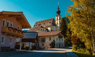 photo of beautiful alpine summer view with a church at Waidring, Tyrol, Austria.