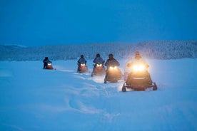 Kiruna: Northern Lights Snowmobile Tour with Transfer