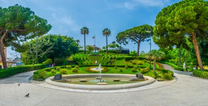 Photo of view of Cefalu and Promontorio de Torre Caldura seen from Norman Castle, La Rocca park, Italy.