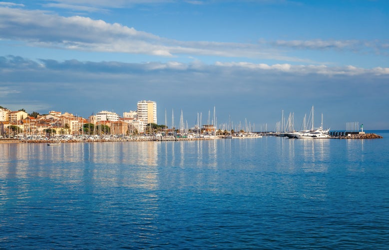 City and sea landscape, the city of Saint-Maxime on the Cote d'Azur, Var, France, a popular destination for summer holidays in Europe