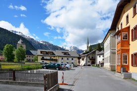 Photo of  beautiful Scuol town in Swiss Alps and Inn river, Switzerland.