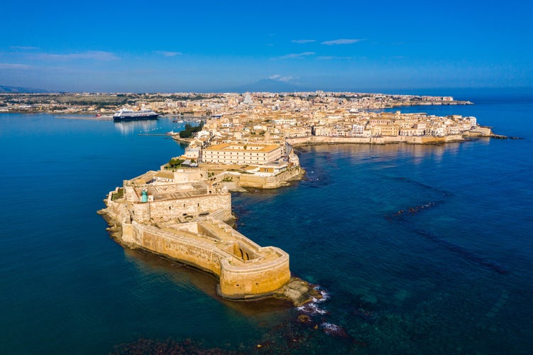 Photo of aerial view of coastline town Syracuse, Sicily and old Ortigia island. 