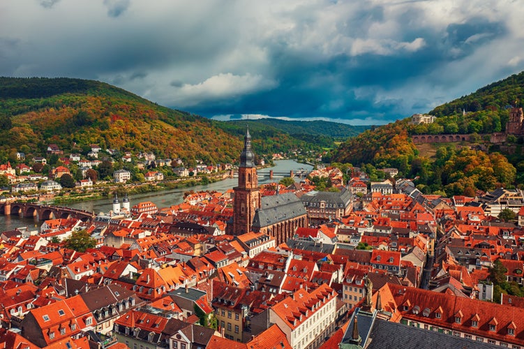 photo of view of Aerial view of landmark and beautiful Heidelberg city with Neckar river, Germany. Heidelberg town with the famous Karl Theodor old bridge and Heidelberg castle.