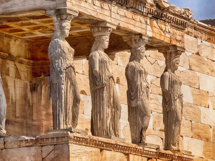 Photo of detail of caryatids statues on the Parthenon on Acropolis Hill, Athens, Greece.