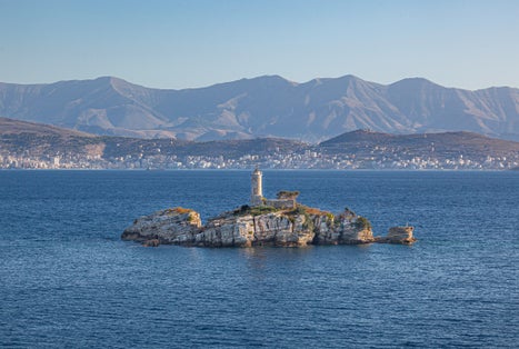 photo of Lighthouse on small island in the sea near Igoumenitsa, Greece.