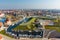 Aerial view of beautiful yachts by the pier in the yacht club in Klaipeda, Lithuania. Klaipeda old castle site. Autumn view of Dane river.