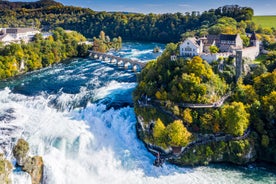 Panoramic view of historic Zurich city center with famous Fraumunster, Grossmunster and St. Peter and river Limmat at Lake Zurich on a sunny day with clouds in summer, Canton of Zurich, Switzerland