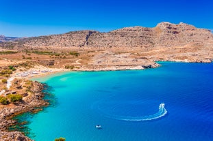 Photo of aerial view of seaside village of Archangelos in Laconia, Greece.