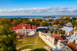 Scenic summer view of the Old Town and sea port harbor in Tallinn, Estonia.