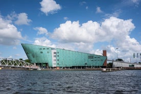 Amsterdam Netherlands dancing houses over river Amstel landmark in old european city spring landscape.