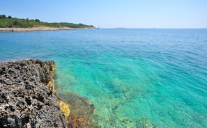 Photo of aerial view of town of Rovinj historic peninsula , famous tourist destination in Istria region of Croatia.