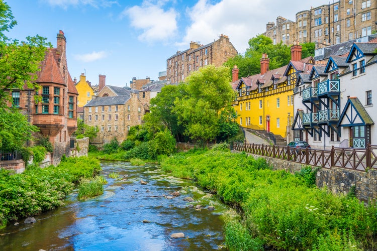 Photo of the scenic Dean Village in a sunny afternoon, in Edinburgh, Scotland.