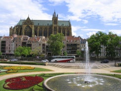 Photo of Metz city view of Petit Saulcy an Temple Neuf and Moselle River in Summer, France.