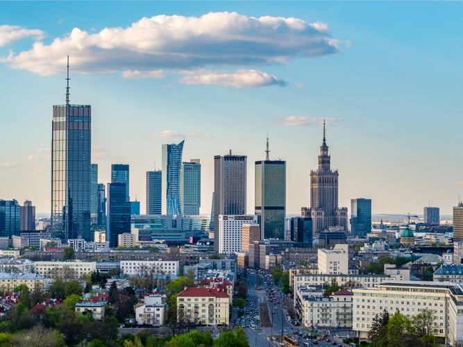 Warsaw city center, PKiN and skyscrapers under blue cloudy sky aerial landscape.jpg