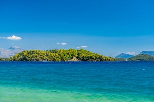 Photo of aerial view of the beautiful beach of Agios Nikitas in Lefkada island, Greece.