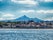 Photo of cityscape of French border town Hendaye, as seen from Spanish Hondarribia, with Famous Rhune Mount at Background, France.