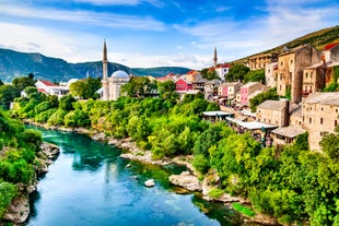 Photo of aerial view of the old bridge and river in city of Mostar, Bosnia and Herzegovina.